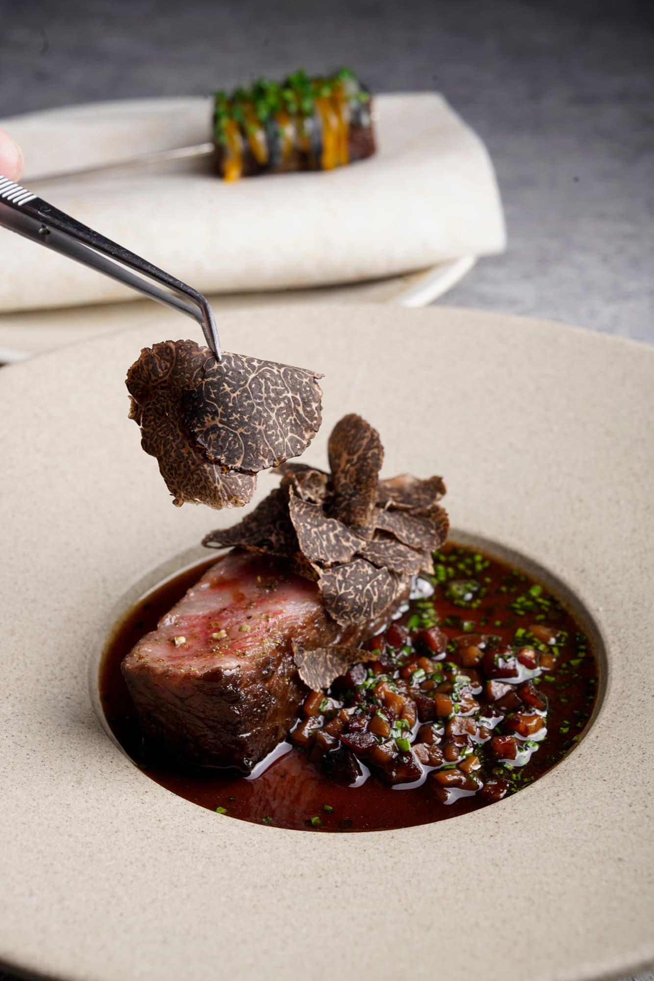 Marmorerad Entrecôte: Charcoal grilled A3 Ribeye with seasonal truffle and Skewer with 3 different Sauces